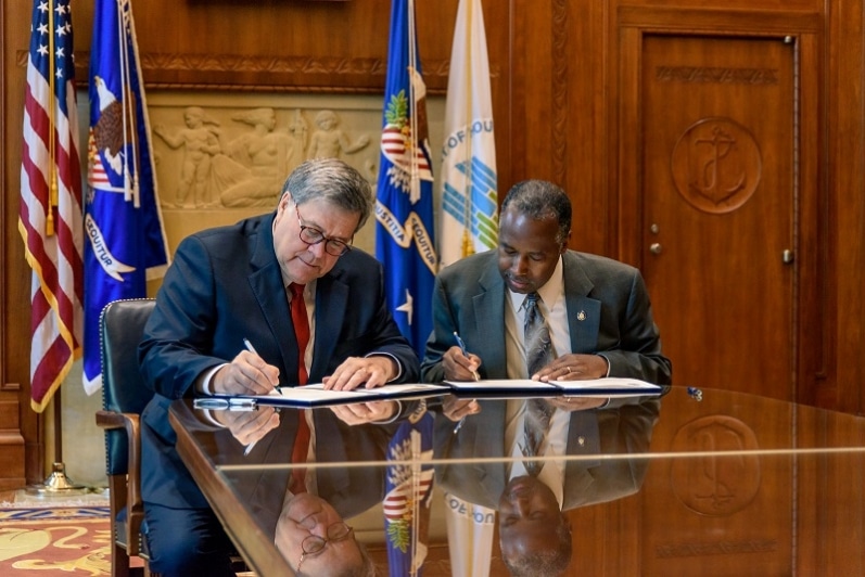 hud-doj-memo-signing